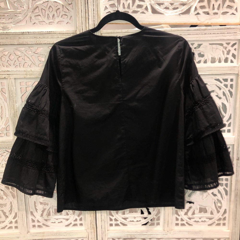 Black flutter sleeve top